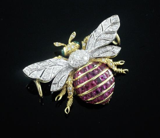 An 18ct gold, ruby, emerald and diamond set bee pendant, gross 11.7 grams.